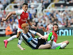 Newcastle United V Arsenal 2015-16 Prints: Coquelin's Intense Tackle on Colback: A Premier League Rivalry Moment