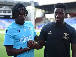 Crystal Palace vs. Arsenal: Nketiah and Eze Share a Moment in the 2022-23 Premier League Clash