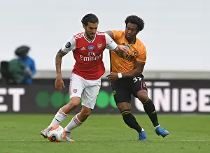 Wolverhampton Wanderers V Arsenal 2019-20 Prints: Dani Ceballos vs Adama Traore: Intense Battle at Wolverhampton Wanderers vs Arsenal FC