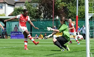Millwall Lionessess V Arsenal Ladies 2014 Prints: Danielle Carter Scores Against Sarah Quintrill: Arsenal Ladies vs Millwall Lionesses in WSL Continental Cup