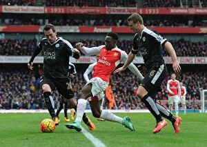 Images Dated 14th February 2016: Danny Welbeck (Arsenal) Christian Fuchs and Robert Huth (Leicester)