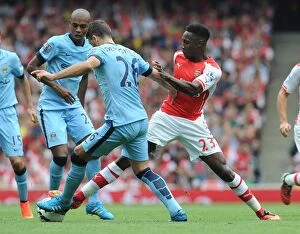 Images Dated 13th September 2014: Danny Welbeck (Arsenal) Martin Demichelis (Man City). Arsenal 2: 2 Manchester City