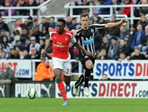 Images Dated 21st March 2015: Danny Welbeck (Arsenal) Ryan Taylor (Newcastle). Newcastle United 1: 2 Arsenal. Barclays