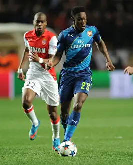 Monaco V Arsenal 2014/15 Prints: Danny Welbeck Breaks Past Monaco's Geoffrey Kondogbia