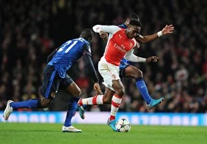 Images Dated 1st February 2009: Danny Welbeck Dashes Past Elderson and Nabil Dirar in Arsenal's UEFA Champions League Clash with