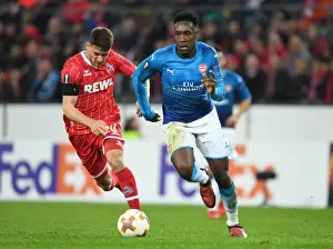 FC Koln V Arsenal 2017-18 Prints: Danny Welbeck Dashes Past Salin Ozcan: Arsenal's Europa League Victory Against 1