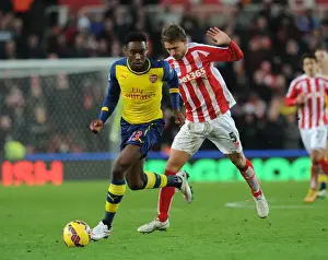Stoke City V Arsenal 2014-15 Prints: Danny Welbeck Outmaneuvers Marc Muniesa: A Moment from Stoke City vs. Arsenal (2014-15)