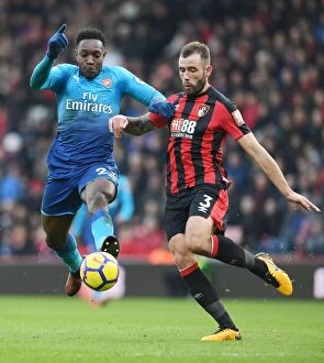 Images Dated 14th January 2018: Danny Welbeck Outsmarts Steve Cook: A Premier League Battle, Arsenal vs. AFC Bournemouth (2017-18)