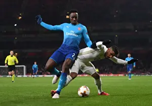 Arsenal V Östersunds FK 2017-18 Prints: Danny Welbeck vs. Hosam Aiesh: Arsenal's Battle in Europa League Against Östersunds