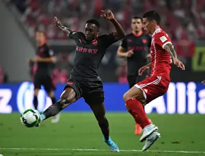 Bayern Munich V Arsenal 2017-18 Prints: Danny Welbeck vs James Rodriguez: Battle in Shanghai - Bayern Munich vs Arsenal Pre-Season Clash
