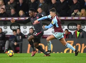 Images Dated 26th November 2017: Danny Welbeck vs. Matthew Lowton: A Battle in the Premier League Clash Between Burnley and Arsenal