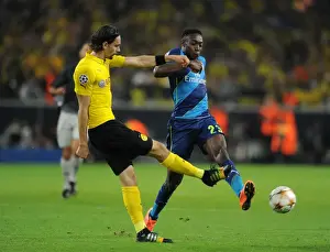 Danny Welbeck vs. Neven Subotic: Intense Battle in Borussia Dortmund vs. Arsenal UEFA Champions League Clash