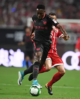 Bayern Munich V Arsenal 2017-18 Prints: Danny Welbeck vs. Rafinha: Battle in Shanghai - Bayern Munich vs. Arsenal Pre-Season Clash