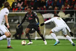 Ostersunds V Arsenal 2017-18 Prints: Danny Welbeck vs. Sotirios Papagiannopoulos: A Battle in the Europa League between Ostersunds and Arsenal
