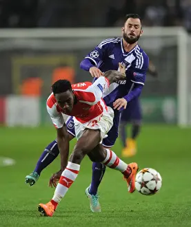 Anderlecht V Arsenal 2014-15 Prints: Danny Welbeck vs. Steven Defour: Intense Battle in Arsenal's UEFA Champions League Clash with Anderlecht