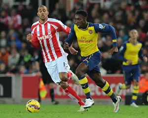 Stoke City V Arsenal 2014-15 Prints: Danny Welbeck vs. Steven Nzonzi: Intense Battle in Stoke City vs