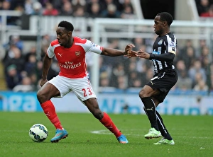 Newcastle United V Arseal 2014/15 Prints: Danny Welbeck vs. Vurnon Anita: Intense Battle at St