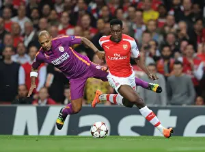 Arsenal V Galatasaray 2014/15 Champions League Prints: Danny Welbeck's Brilliant Outmaneuver of Felipe Melo: Arsenal's Thrilling Champions League Victory