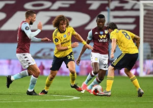Images Dated 22nd July 2020: David Luiz Clashes with Hourihane and Samatto in Aston Villa vs. Arsenal Premier League Showdown