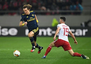 Images Dated 20th February 2020: David Luiz vs. Giorgos Masouras: Arsenal's Battle in the UEFA Europa League Against Olympiacos