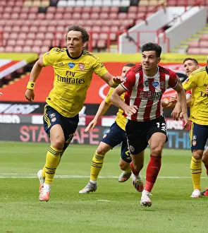 Sheffield United V Arsenal - FA Cup 2019-20 Prints: David Luiz vs John Egan: Clash of the Captains in FA Cup Quarterfinal Between Sheffield United and Arsenal