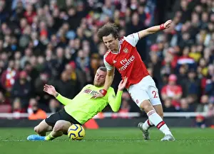 David Luiz vs Oli McBurnie: A Battle of Willpower at the Emirates