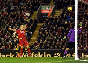 Liverpool V Arsenal 2014/15 Prints: Debuchy Soars Above Skrtel: Arsenal's First Goal vs. Liverpool (2014/15)