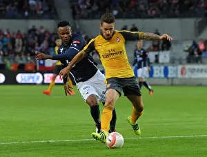 Viking FK V Arsenal 2016-17 Prints: Debuchy vs Adegbenro: A Clash in Pre-Season Friendly Between Viking FK and Arsenal