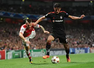 Arsenal V Besiktas 2014/15 Prints: Debuchy vs. Pektemek: Intense Face-Off in Arsenal's Champions League Battle