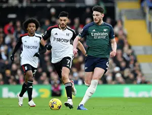 Declan Rice Battles Past Raul Jimenez in Intense Premier League Showdown: Fulham vs. Arsenal (2023-24)