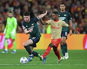 RC Lens V Arsenal 2023-24 Prints: Declan Rice Faces Off Against Wesley Said: Arsenal vs