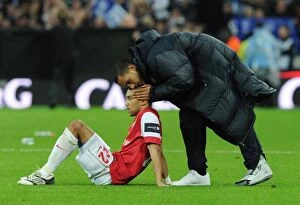 Dejected Arsenal players Gael Clichy and Theo Walcott. Arsenal 1:2 Birmingham City