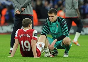 Dejected Arsenal players Wojciech Szczesny and Jack Wilshere. Arsenal 1:2 Birmingham City