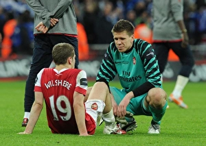 Dejected Arsenal players Wojciech Szczesny and Jack Wilshere. Arsenal 1: 2 Birmingham City