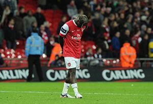 Dejected Bacary Sagna (Arsenal). Arsenal 1:2 Birmingham City, Carling Cup Final