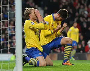 Dejected Duo: Bendtner and Giroud's Missed Opportunities in Manchester United vs Arsenal (2013-14)