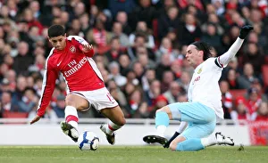 Arsenal v Burnley 2009-10 Gallery: Denilson (Arsenal) Chris Eagles (Burnley). Arsenal 3: 1 Burnley. Barclays Premier League