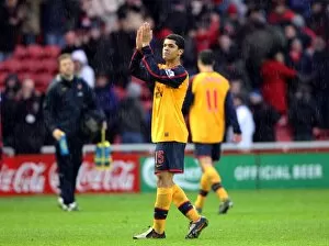 Images Dated 13th December 2008: Denilson (Arsenal) claps the fans after the match