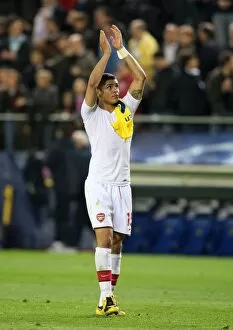 Denilson (Arsenal) claps the fans after the match