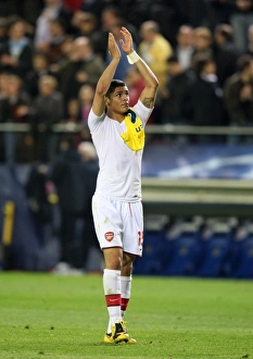 Denilson Gallery: Denilson (Arsenal) claps the fans after the match