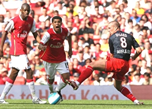 Denilson (Arsenal) Didier Digard (PSG)