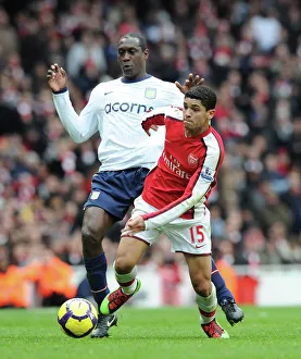 Arsenal v Aston Villa 2009-10 Collection: Denilson (Arsenal) Emile Heskey (Aston Villa). Arsenal 3: 0 Aston Villa