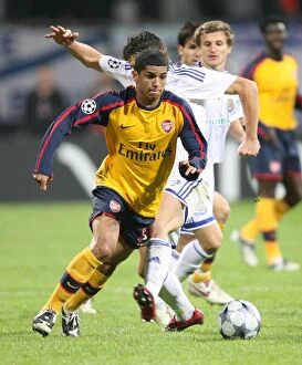 Images Dated 17th September 2008: Denilson (Arsenal) Ognjen Vukojevic (Dynamo Kiev)