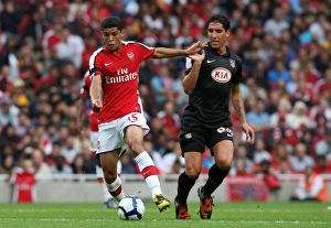 Denilson Gallery: Denilson (Arsenal) Raul Garcia (Atletico)