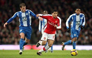 Images Dated 6th December 2008: Denilson (Arsenal) Ryan Taylor (Wigan)
