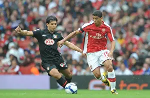 Arsenal V Athletico Madrid 2009-10 Prints: Denilson (Arsenal) Sergio Aguero (Athletico Madrid)