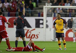 Images Dated 13th August 2008: Denilson (Arsenal) is shown the yellow card by referee