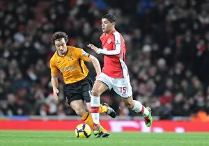 Images Dated 19th December 2009: Denilson (Arsenal) Stephen Hunt (Hull). Arsenal 3: 0 Hull City, Barclays Premier league
