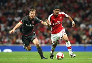 Denilson (Arsenal) Wout Brama (FC Twente)