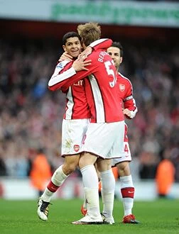 Arsenal v West Ham United 2009-10 Collection: Denilson shoots celebrates scoring the 1st Arsenal goal with Nicklas Bendtner